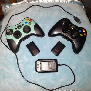 XBOX 360 wireless controllers with 2 rechargeable battery packs and charger.